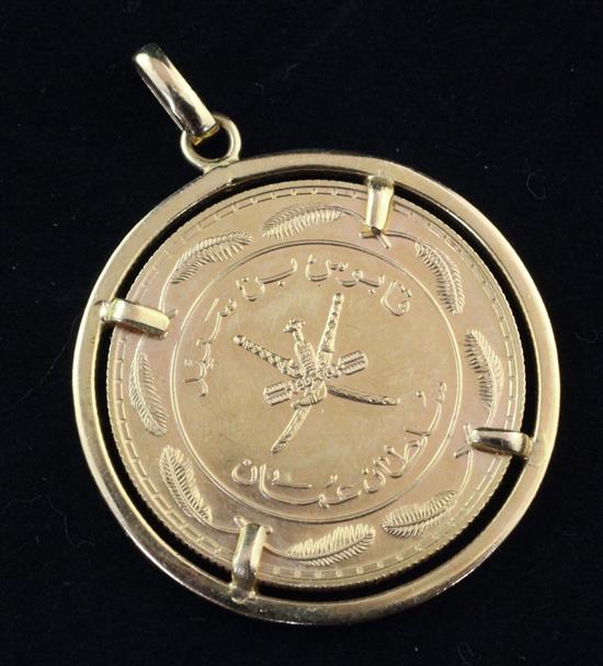 A Sultanate of Oman gold proof half rial in pendant mount.